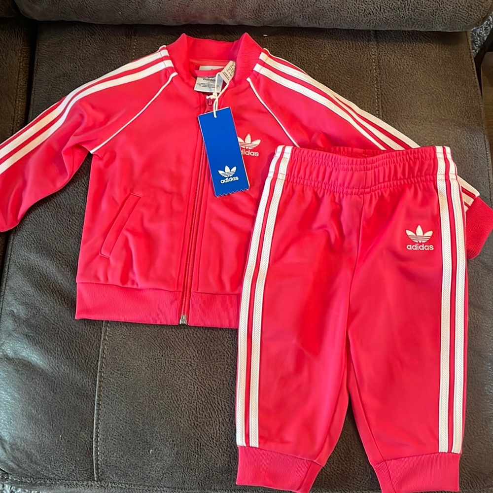 Brand new never worn adidas superstar suit . Comes with tag